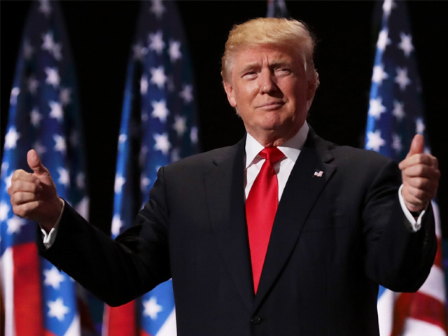 donald trump gives two thumbs up to the crowd during the evening session of the republican national convention day four photo getty