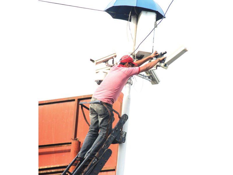 cctv cameras have been placed around busy intersections in dha such as the one above on the corner of khayaban e ittehad and korangi road photo ayesha mir express