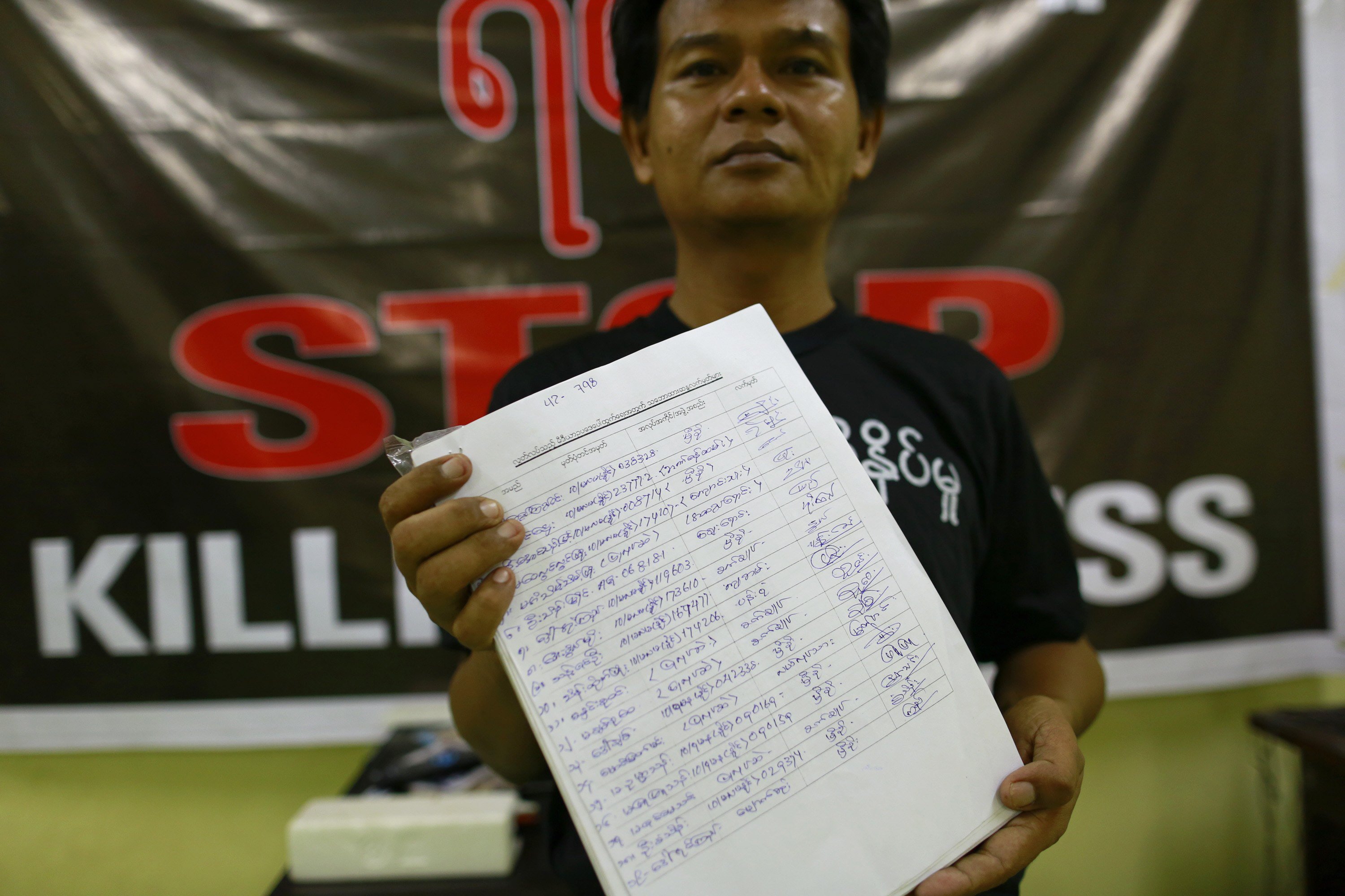 a reporter shows signatures they collected in support of the freedom press law in the myanmar journalist network office in yangon september 3 2013 photo reuters