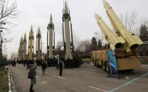 us imposes new curbs against suppliers of weapons to iran