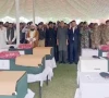 interior minister mohsin naqvi state minister for interior tala chaudhry and other officials offer funeral prayers at the fc headquarters in peshawar for the fc personnel martyred while confronting terrorists on the city s outskirts photo express
