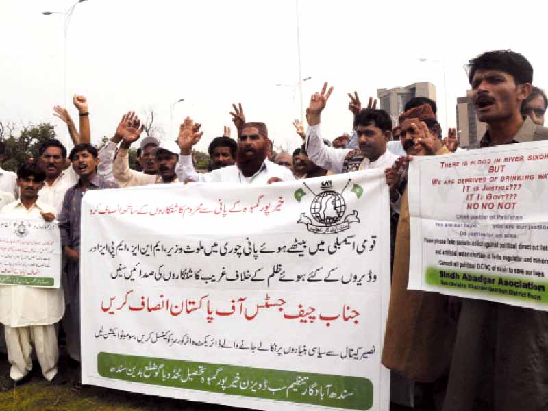 members of the sindh abadgar association from badin s sub division khairpur gamboh holding a protest demonstration outside the national press club in islamabad photo zafar aslam express