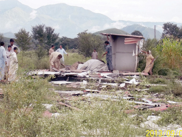 assistant commissioner abbottabad usama wariach led the operation accompanied by a heavy contingent of police photo express assistant commissioner abbottabad usama wariach led the operation accompanied by a heavy contingent of police photo express