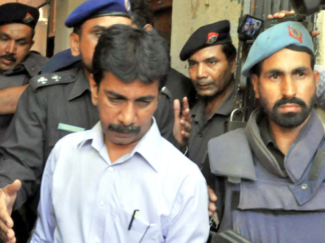 police escort ex mpa nadeem hashmi after acquiring his remand from the court photo inp police escort ex mpa nadeem hashmi after acquiring his remand from the court photo inp
