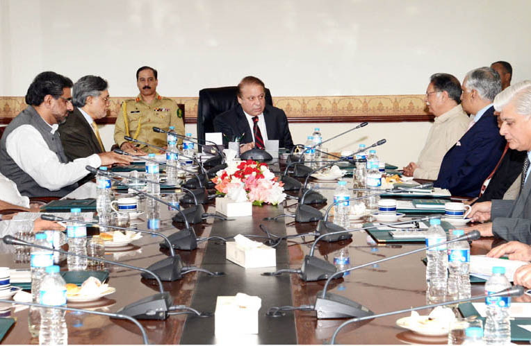 prime minister nawaz sharif chairing a high level meeting on pia affairs at the prime minister s office photo pid