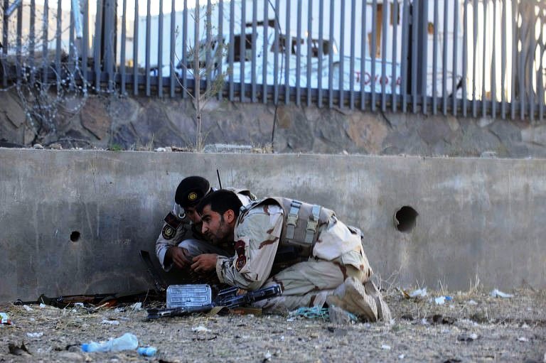 security forces take position during an attack on us consulate in herat afghanistan on september 13 2013 photo afp