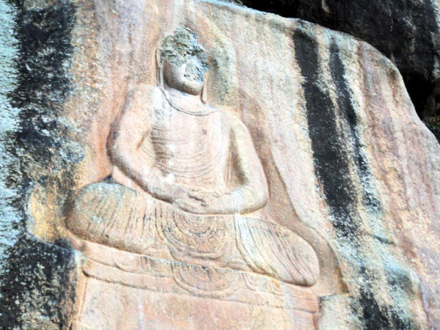 a rock carving of buddha at jahanabad photo fazal khaliq express a rock carving of buddha at jahanabad photo fazal khaliq express