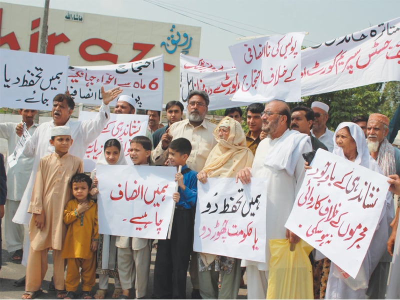 relatives of a missing person from hashtnagri held a protest against the police for not registering their fir despite the accused being nominated photo muhammad iqbal express