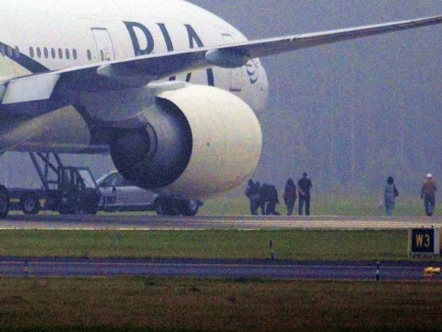 the plane will resume its flight for england after a re fuel photo file