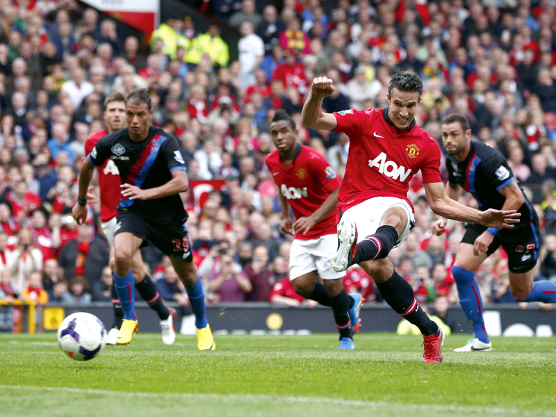 van persie s first half penalty and rooney s late free kick ended the english premier league champions run of two matches without a win as they defeated crystal palace 2 0 yesterday photo reuters