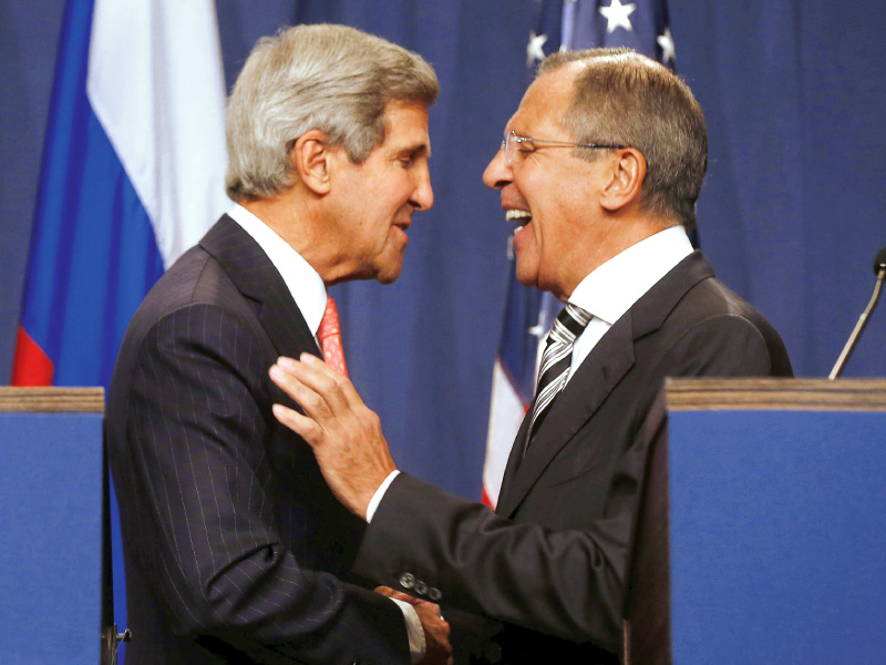 us secretary of state john kerry shares a laugh with russian foreign minister sergei lavrov at the end of a press conference in geneva on saturday photo afp