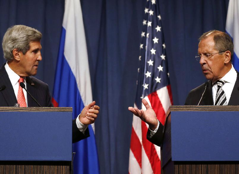 u s secretary of state john kerry l and russian foreign minister sergei lavrov gesture following meetings regarding syria at a news conference in geneva september 14 2013 photo reuters