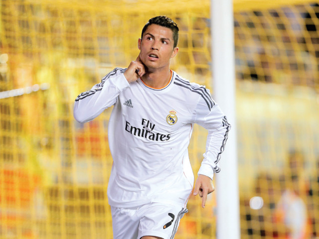 ronaldo signed a new contract with real madrid yesterday to end speculation linking him with a return to manchester united photo afp ronaldo signed a new contract with real madrid yesterday to end speculation linking him with a return to manchester united photo afp