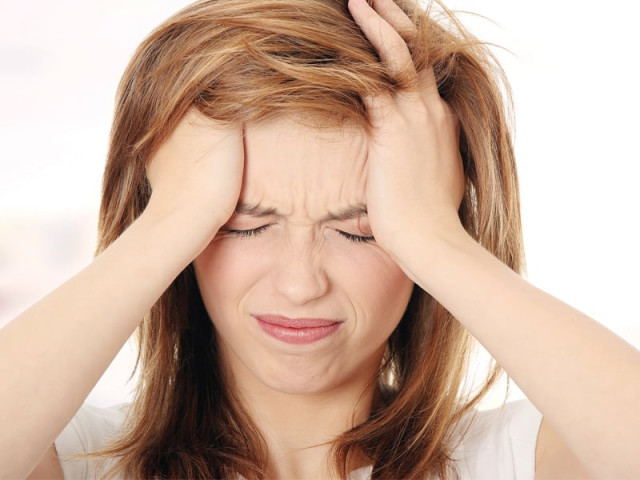 people should exercise regularly in order to prevent both obesity and migraines photo file