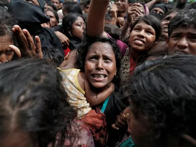 a woman reacts as rohingya refugees wait to receive aid in cox 039 s bazar bangladesh september 21 2017 photo reuters a woman reacts as rohingya refugees wait to receive aid in cox 039 s bazar bangladesh september 21 2017 photo reuters