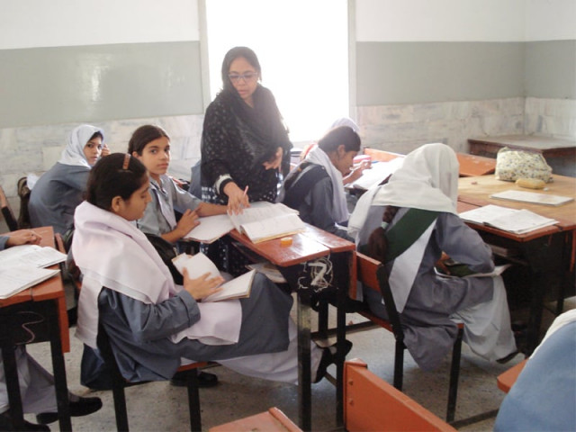 teacher and students of najeeb shaheed city district government elementary school in tekro colony are enjoying the renovations that were carried out by think bee as part of their project to improve 42 government schools in na 250 photo express teacher and students of najeeb shaheed city district government elementary school in tekro colony are enjoying the renovations that were carried out by think bee as part of their project to improve 42 government schools in na 250 photo express