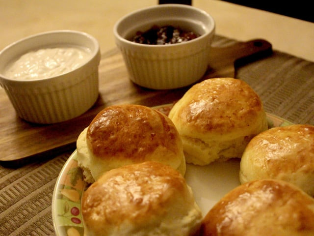 traditional english scones may include raisins or currants but are often plain relying on jam preserves lemon curd or honey for added flavour perhaps with a touch of clotted cream photo arhama siddiqa