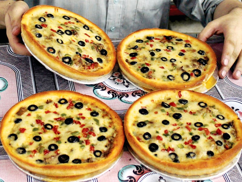 pizza is becoming more popular in peshawar but only two major joints offer it photo muhammad iqbal