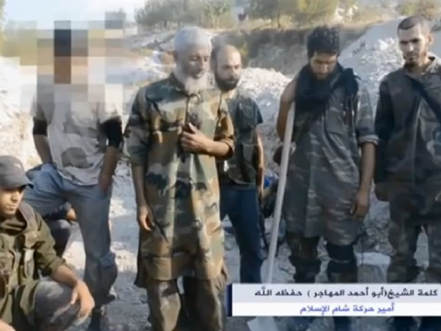 screenshot of a video posted on youtube showing the eulogy at the august 5 funeral of mohammad al alami