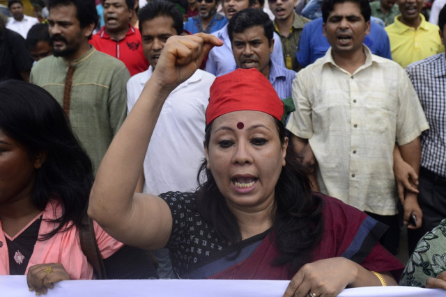 bangladeshi social activists shout anti strike slogans during rally against a strike called by bangladesh jamaat e islami photo afp bangladeshi social activists shout anti strike slogans during rally against a strike called by bangladesh jamaat e islami photo afp