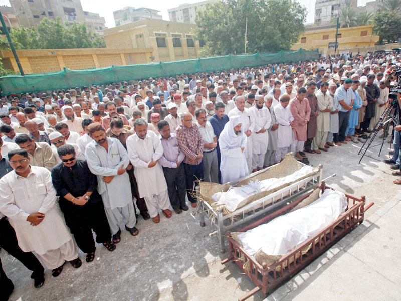 the funeral prayers of outlawed pac leader zafar baloch were offered at football grounds in lyari and were attended by a large number of people later baloch and his guard were laid to rest at the mewa shah graveyard photo athar khan express