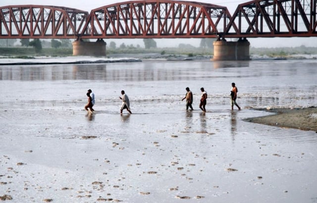 a very high flood level in sutlej river on sunday compelled the authorities to step up their evacuation measures in various areas of the punjab province photo file