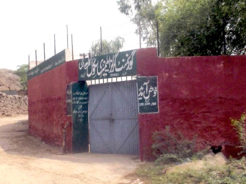 the main gate of the school left schoolgirls in a brightly furnished classroom photo express
