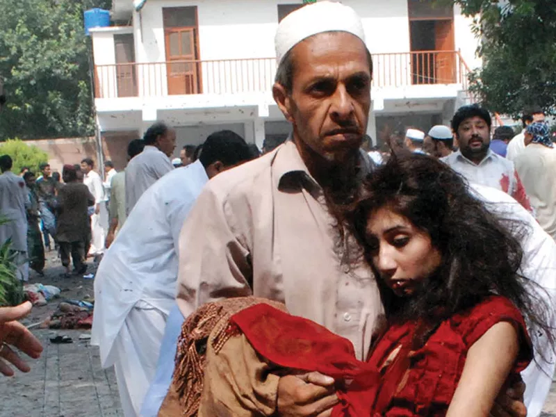 twin suicide attacks turn religious service into mass mourning worshippers and those nearby helped fellow beings to the ambulances and consoled the bereaved souls photo inp reuters twin suicide attacks turn religious service into mass mourning worshippers and those nearby helped fellow beings to the ambulances and consoled the bereaved souls photo inp reuters