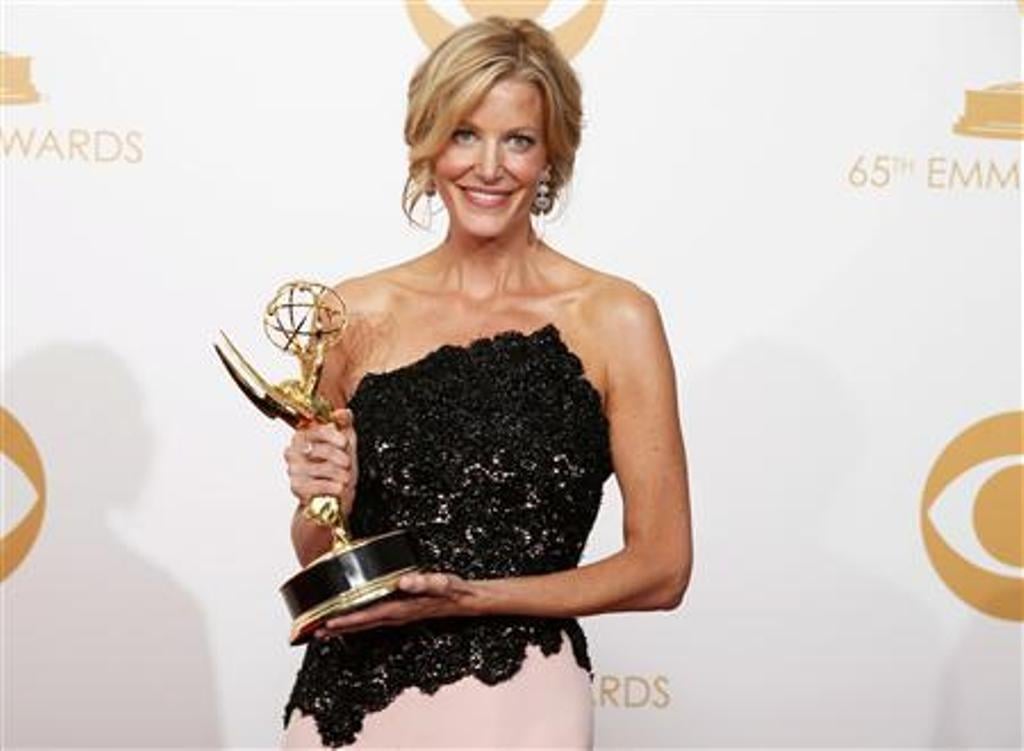 actress anna gunn from amc 039 s series 039 breaking bad 039 039 poses backstage with her award for outstanding supporting actress in a drama series at the 65th primetime emmy awards in los angeles september 22 2013 photo reuters