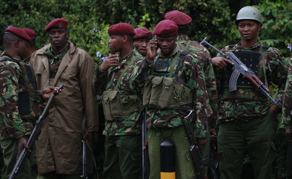 kenyan policemen gather for a briefing near the westgate shopping centre in the capital nairobi september 23 2013 photos reuters