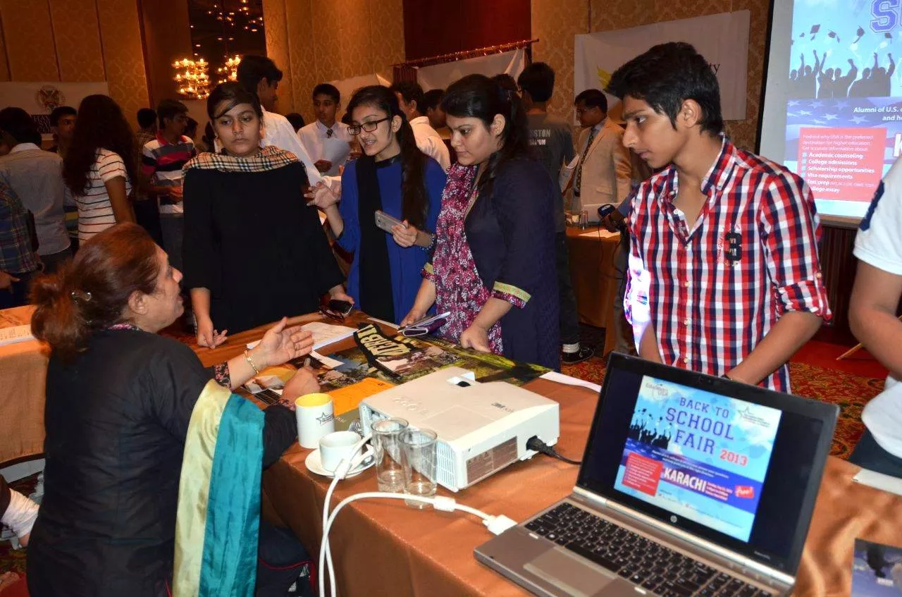 students post queries at the back to school fair in karachi photo courtesy us consulate facebook page students post queries at the back to school fair in karachi photo courtesy us consulate facebook page