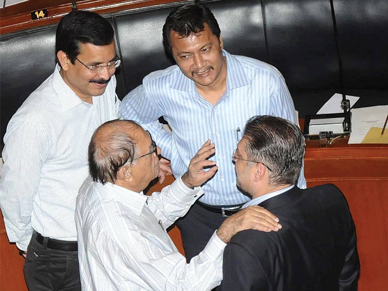 information minister sharjeel inam memon enjoys a laugh with mqm mpas during the assembly session on monday photo rashid ajmeri express