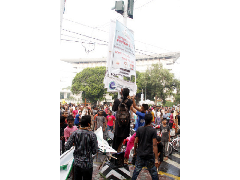 civil society activists hold placards condemning the attack photo abid nawaz express