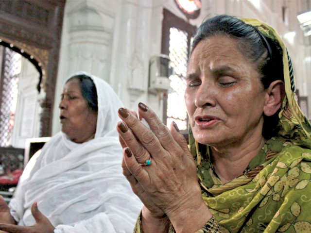 relatives neighbours poured in to offer prayers for the deceased photo muhammad iqbal expres