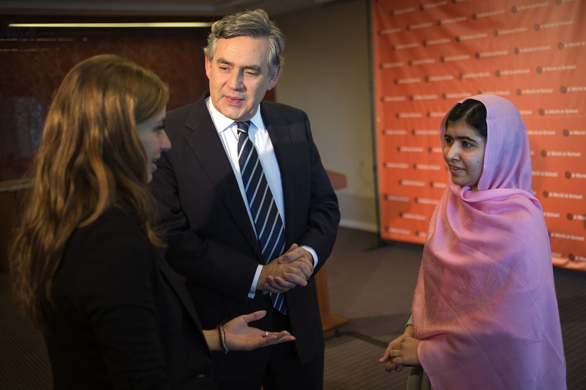 un special envoy for global education and former prime minister gordon brown c stands between malala yousafzai r photo reuters