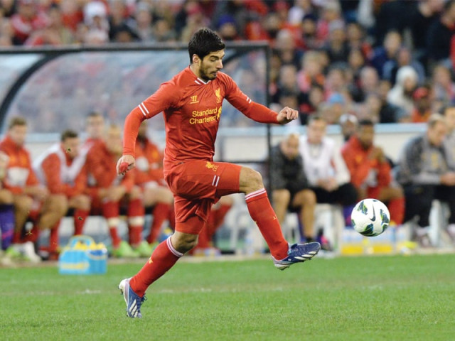 suarez will be playing in his first official club game since april 21 having now completed a 10 game ban for biting branislav ivanovic last season photo afp suarez will be playing in his first official club game since april 21 having now completed a 10 game ban for biting branislav ivanovic last season photo afp