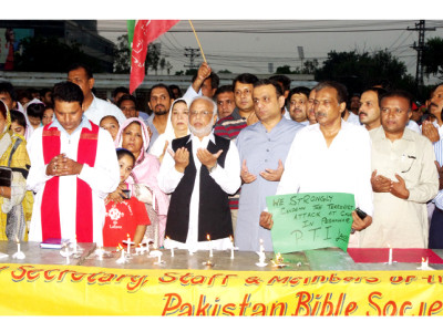 in remembrance pti holds vigil for bombing victims