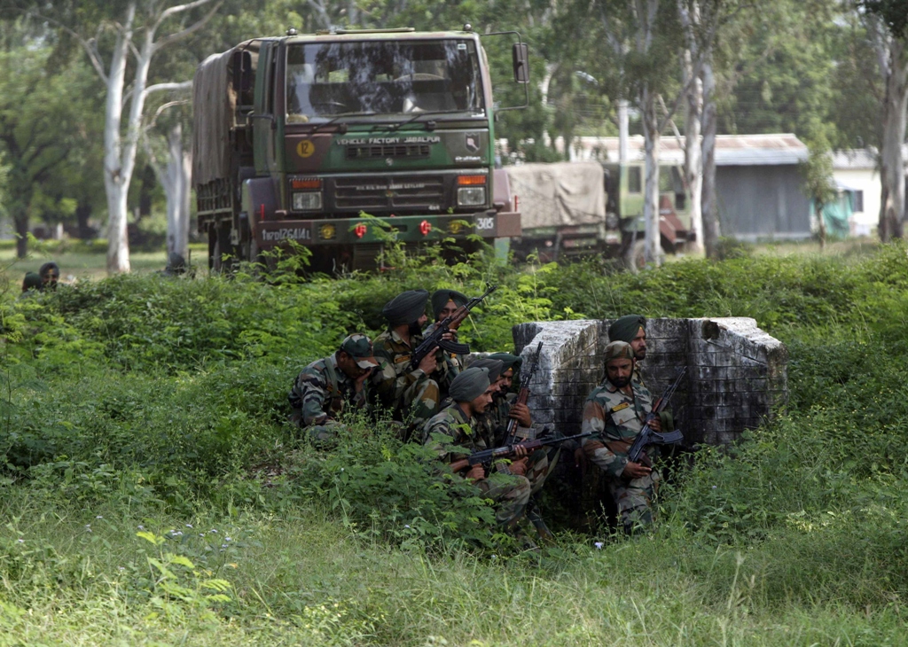 indian army soldiers take up position near an army camp during a gun battle on september 26 2013 photo reuters