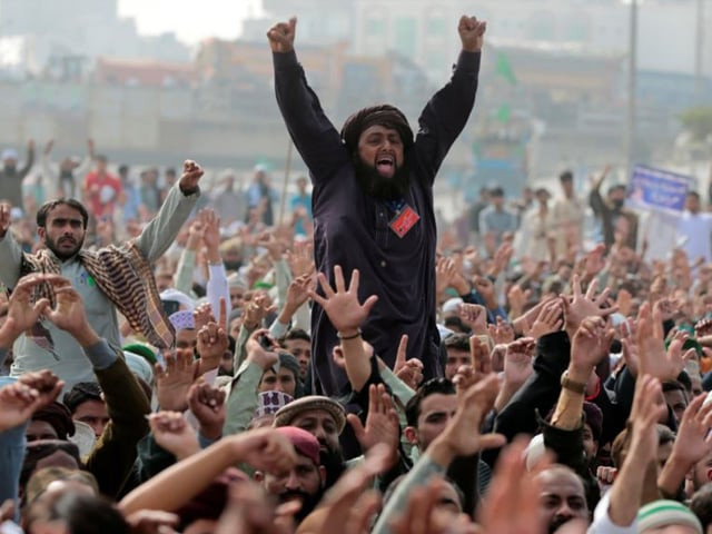 members of the tehreek e labaik pakistan far right islamist political party shout slogans during a sit in in rawalpindi and islamabad on november 10 photo reuters members of the tehreek e labaik pakistan far right islamist political party shout slogans during a sit in in rawalpindi and islamabad on november 10 photo reuters