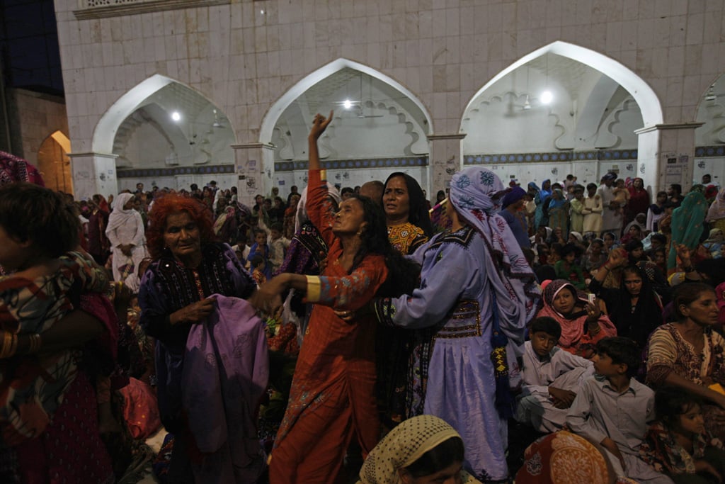 a woman devotee dances in trance to the beat of the drum at the tomb of sufi saint syed usman marwandi also known as lal shahbaz qalandar in sehwan sharif in pakistan 039 s southern sindh province september 5 2013 photo reuters