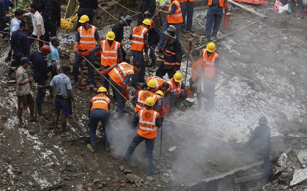 the cave in was the latest in a string of building collapses in and around mumbai in recent months photo reuters