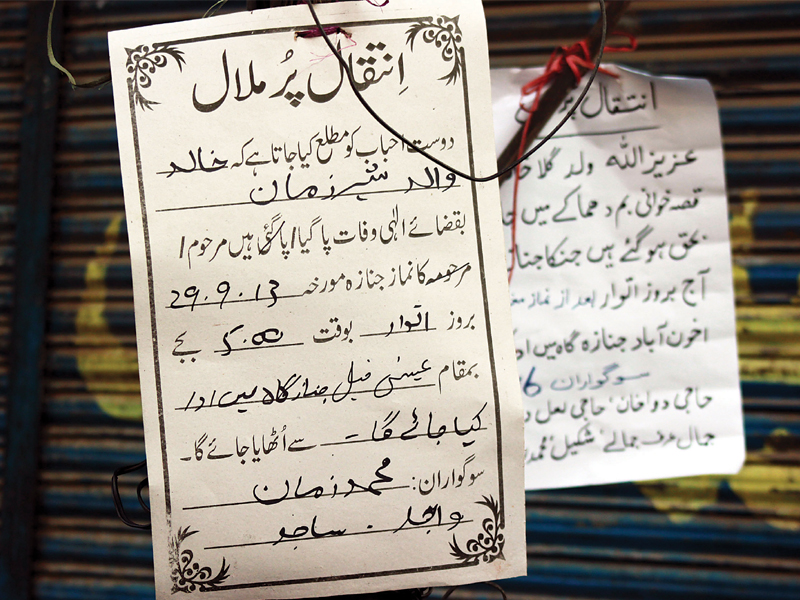 funeral notices went up at qissa khwani bazaar soon after the blast on sunday photo muhammad iqbal express