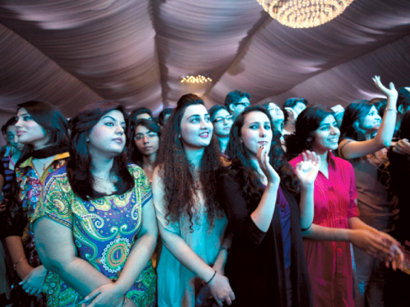 students dance to the beat at ali zafar s concert on sunday evening photo myra iqbal