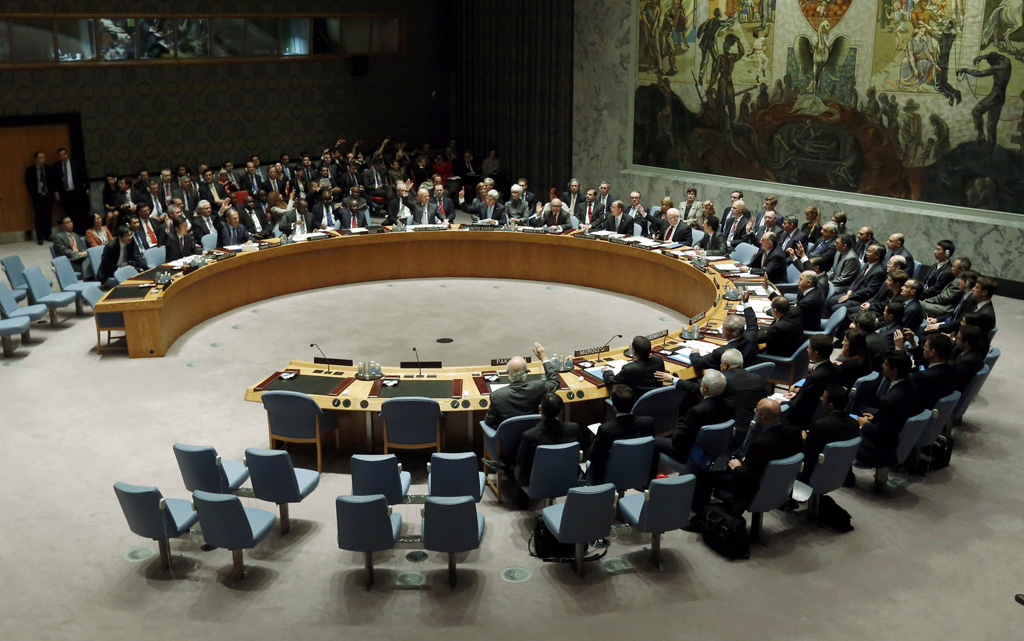 members of the united nations security council raise their hands as they vote unanimously to approve a resolution eradicating syria 039 s chemical arsenal during a security council meeting during the 68th united nations general assembly in new york on september 27 2013 photo reuters