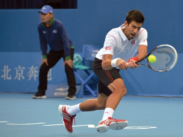 djokovic signalled his intent to reclaim the title he won in the chinese capital last year sweeping aside lukas rosol 6 0 6 3 photo afp djokovic signalled his intent to reclaim the title he won in the chinese capital last year sweeping aside lukas rosol 6 0 6 3 photo afp