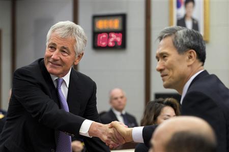 u s secretary of defense chuck hagel l and south korean defense minister kim kwan jin shake hands at the 45th security consultative meeting at the defence ministry in seoul photo reuters