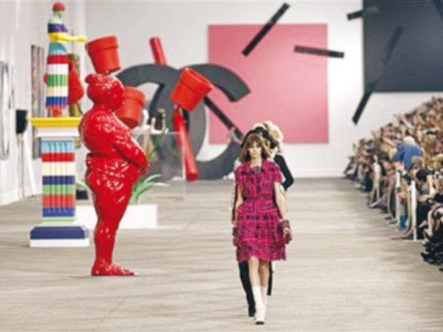 in bright hues of raspberry navy bubble gum pink and black and white artistic director karl lagerfeld played with new takes on the classic chanel silhouette photo file