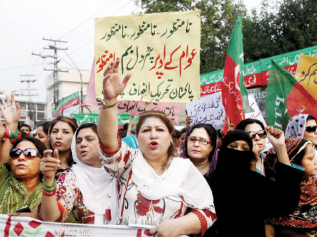 the protesters waved party flags and placards chanted slogans staged a sit in and cheered as pti leaders made speeches demanding the withdrawal of the pml nawaz government s decision to increase prices photo shafiq malik express the protesters waved party flags and placards chanted slogans staged a sit in and cheered as pti leaders made speeches demanding the withdrawal of the pml nawaz government s decision to increase prices photo shafiq malik express