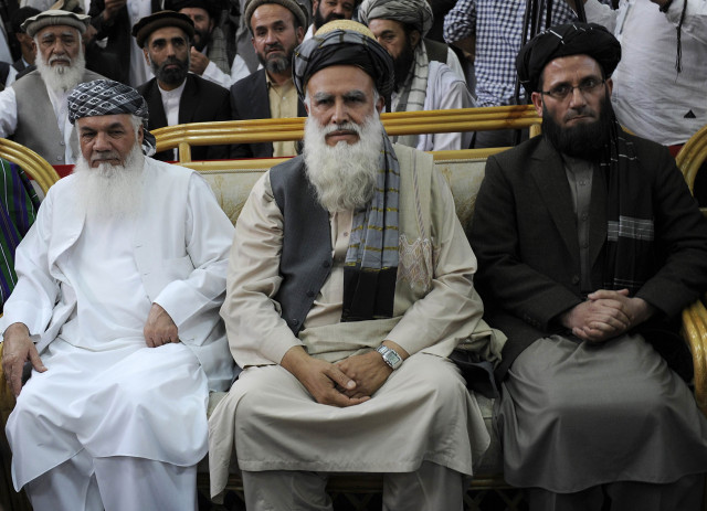 former warlord abdul rasul sayyaf c sits with his two vice presidential candidates mohammad ismail khan l and abdul wahab erfan during a registration process for the presidential elections in kabul on october 3 2013 photo afp former warlord abdul rasul sayyaf c sits with his two vice presidential candidates mohammad ismail khan l and abdul wahab erfan during a registration process for the presidential elections in kabul on october 3 2013 photo afp