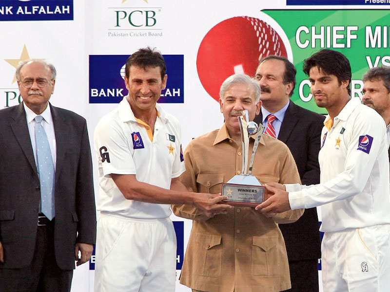 chief minister punjab shahbaz sharif presented the trophy to captains younus khan chief ministers xi and umar amin pcb chairman s xi as the practice match between the 28 probables for the squad of the south africa series ended in a draw yesterday photo pcb